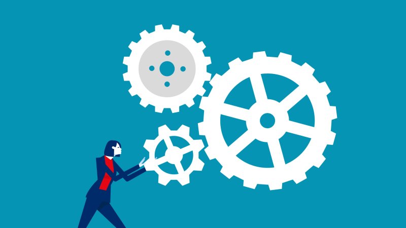 Persoon die mechanisme aanstuurt